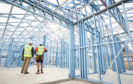 builders looking at LGS frames